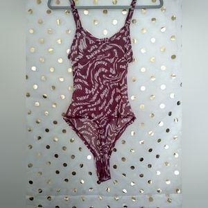 Skims, NWT, raspberry swirl thong bodysuit, sold out on Skims. 2x .no flaws.